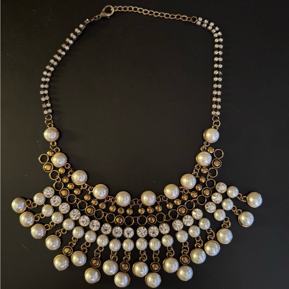 Anthropologie Pearl and rhinestone gold statement necklace.